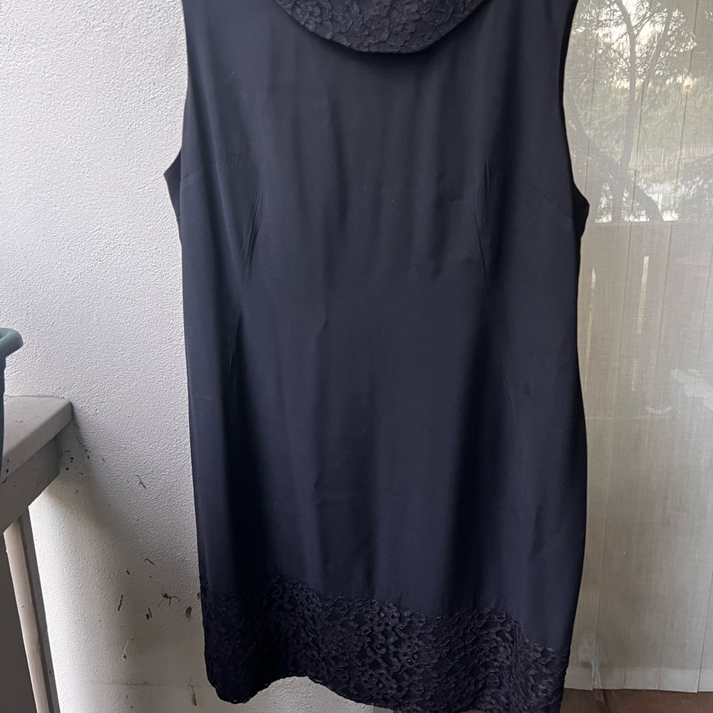 Elegant Vintage 1960s Black Sleeveless Dress with Lace Hem & collar
